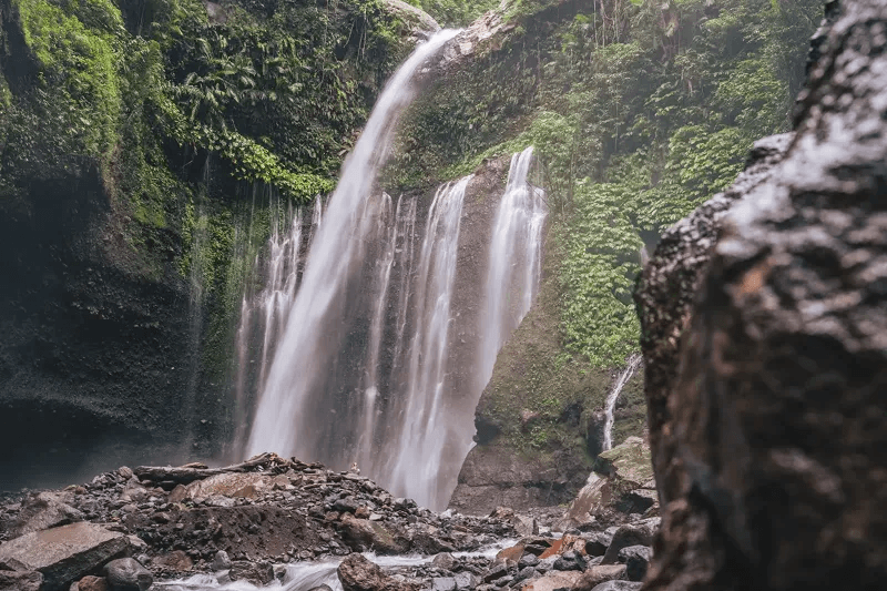 The beauty of Tiu Kelep Waterfalls Lombok. By wirestock